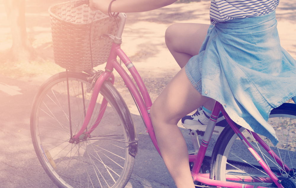 legs, woman riding bicycle