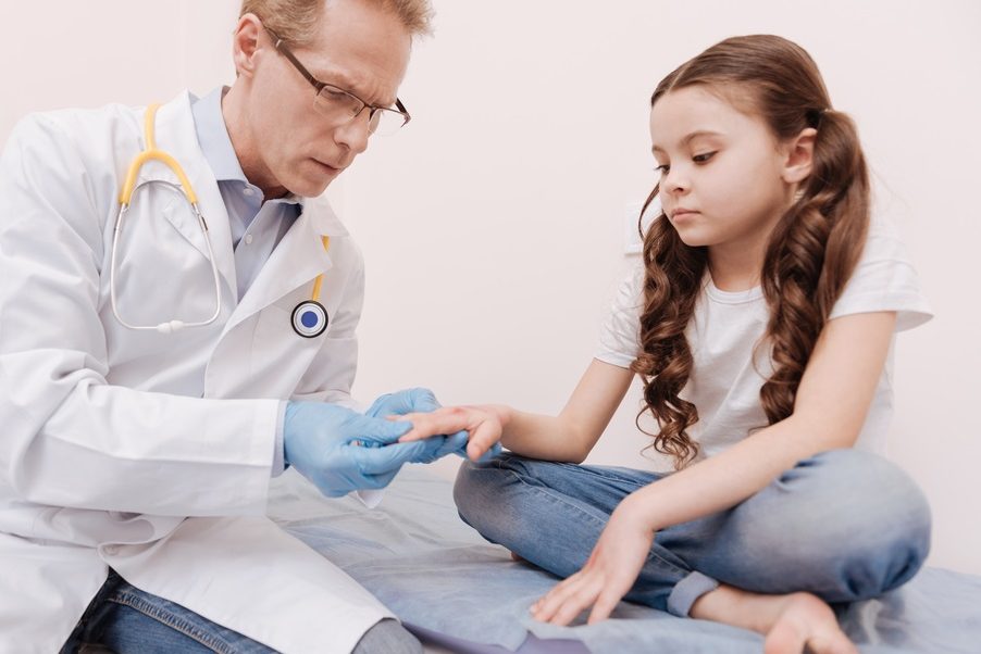dermatologist checking child
