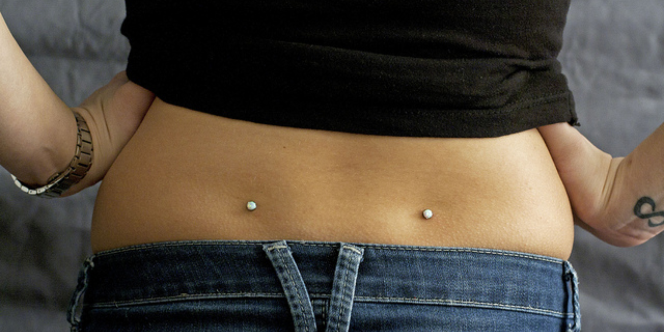 Piercing The Unusual: All About Back Dimple Piercings